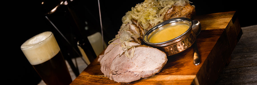 Rotisserie Pork Loin With Beer Sauce And Sauerkraut
